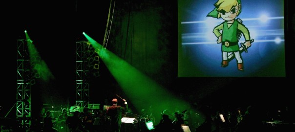 LONDON - NOVEMBER 25: Music from the video game Zelda is performed during 'Video Games Live' by the English National Ballet Orchestra and the Apollo Voice Choir at the Hammersmith Apollo on November 25, 2006 in London, England. The performance combines strobe lighting and a big screen backdrop with a musical interpretation of well known video games. (Photo by Gareth Cattermole/Getty Images)